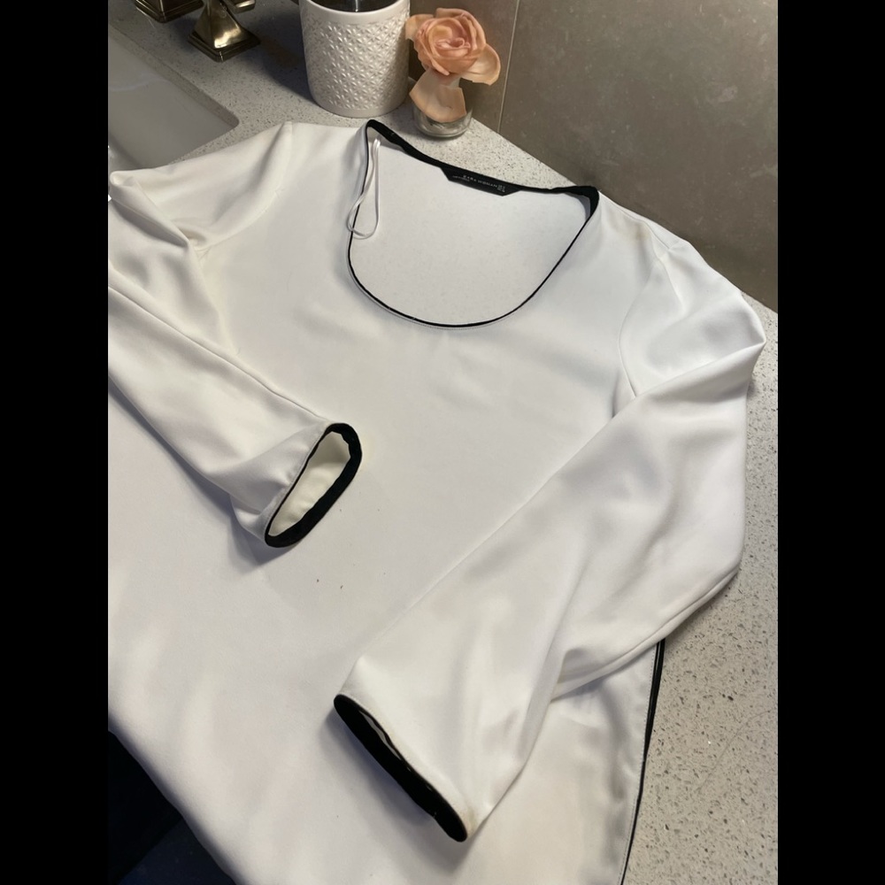 NWOT Elegant White/Cream Long-Sleeve Top with Black Trim
